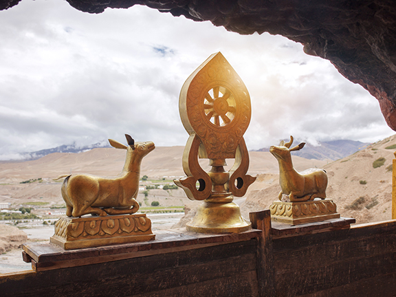 буддийская статуэтка колеса сансары