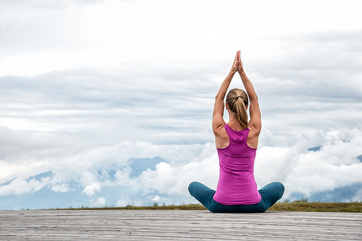 girl doing yoga in nature