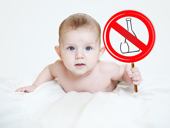 младенец с табличкой не пить фото